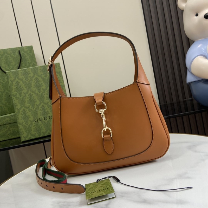 G*u*i top handle bags